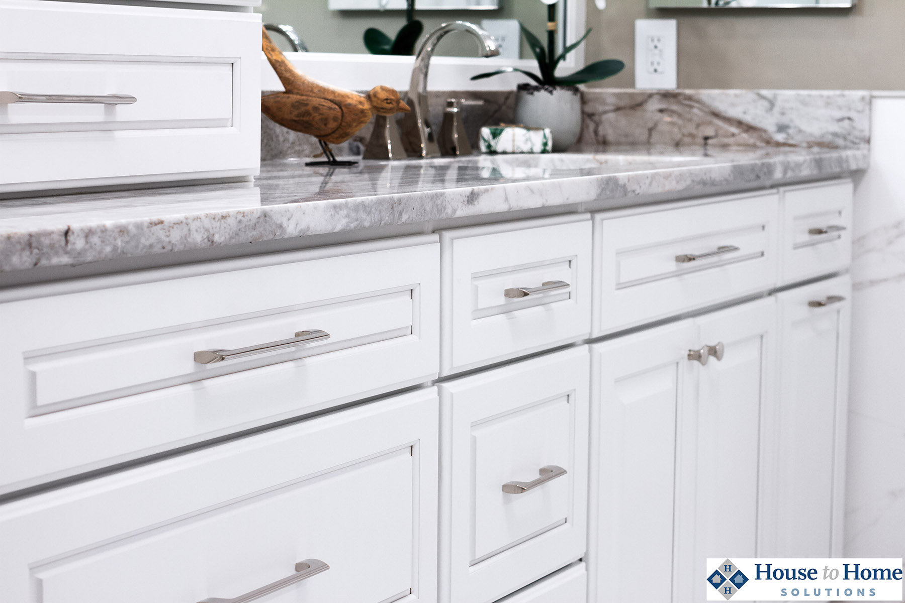 This customer is very happy with their new white painted bathroom vanity.